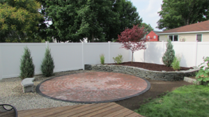 Circular patio and stone wall in Concord NH