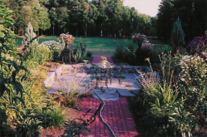 Formal garden in Bedford NH designed by DeJohn Landscaping