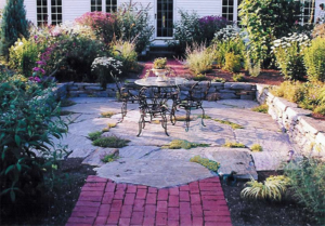 Formal patio with perennial garden in Bedford NH