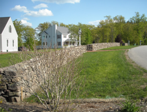 Large stone walls for a classic landscape in New Hampshire