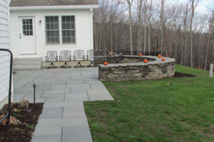Patio and stone sitting wall in Canterbury NH