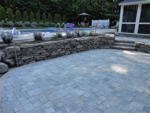 Stone retaining wall with patio in Concord NH